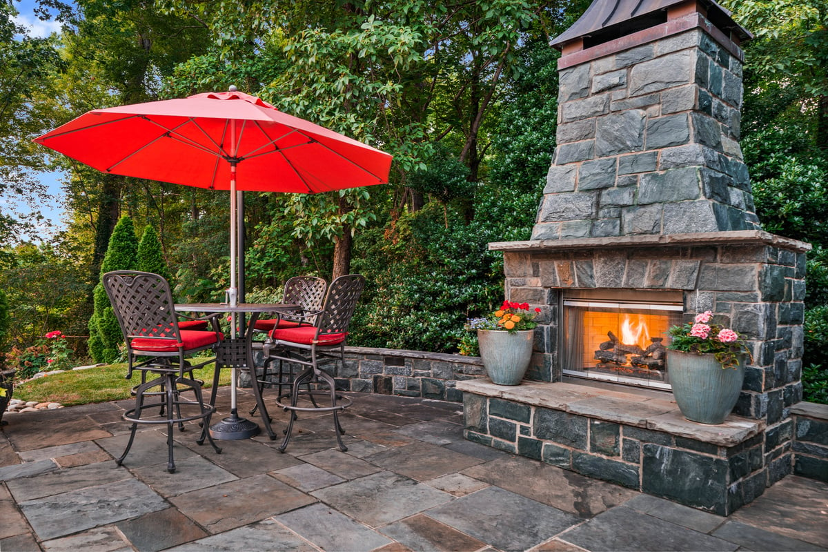 Red Patio Umbrella Near Green Plants